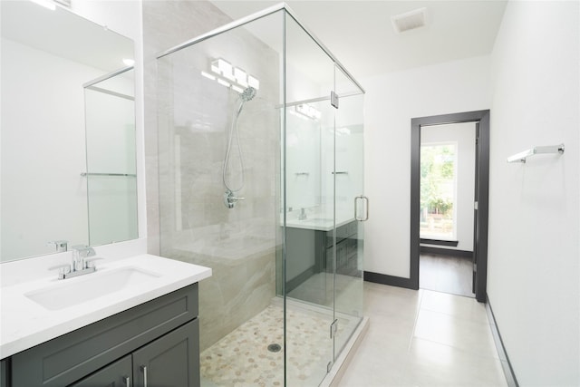 4417 Aledo St, Houston, TX 77051 - bathroom with vanity, a shower stall, and tile patterned floors