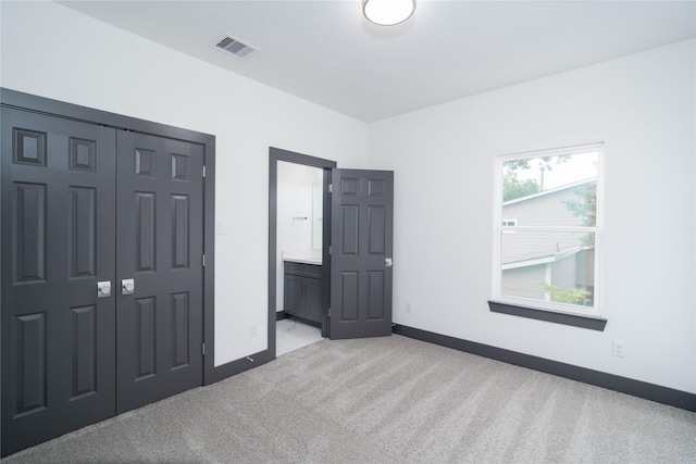 4417 Aledo St, Houston, TX 77051 - unfurnished bedroom featuring light carpet, ensuite bath, and a closet