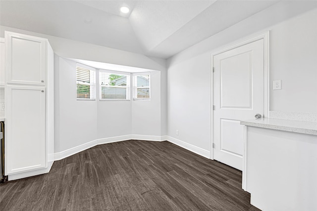 639 Ames St, Spring, TX 77373 - empty room with dark wood finished floors and lofted ceiling