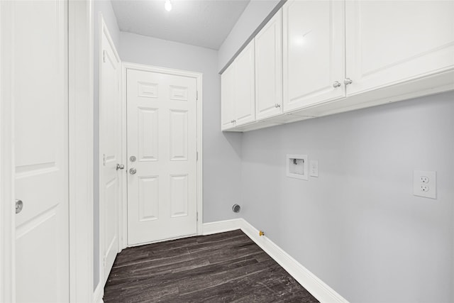 639 Ames St, Spring, TX 77373 - laundry area featuring gas dryer hookup, washer hookup, cabinet space, dark wood-type flooring, and electric dryer hookup