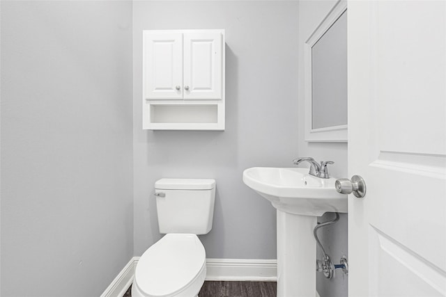 639 Ames St, Spring, TX 77373 - half bathroom with toilet and baseboards