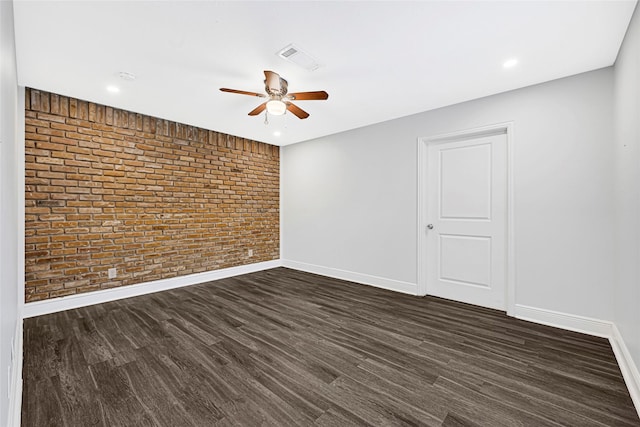 639 Ames St, Spring, TX 77373 - unfurnished room with brick wall, ceiling fan, dark wood-type flooring, and recessed lighting