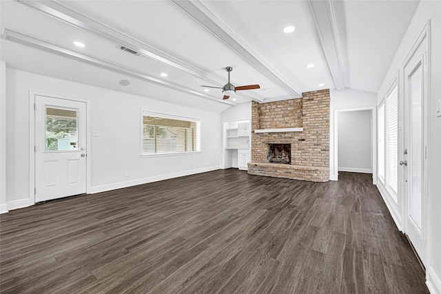 639 Ames St, Spring, TX 77373 - unfurnished living room featuring dark wood finished floors, a ceiling fan, a fireplace, and recessed lighting