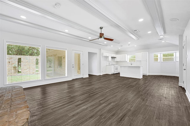 639 Ames St, Spring, TX 77373 - unfurnished living room with ceiling fan, dark wood-type flooring, recessed lighting, and beam ceiling