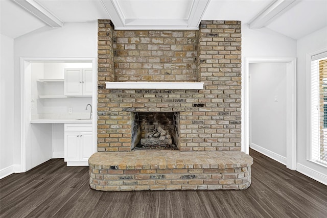639 Ames St, Spring, TX 77373 - unfurnished living room with dark wood-style flooring and a fireplace
