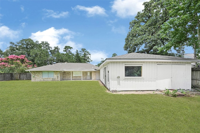 639 Ames St, Spring, TX 77373 - rear view of property featuring a fenced backyard, board and batten siding, and a shingled roof