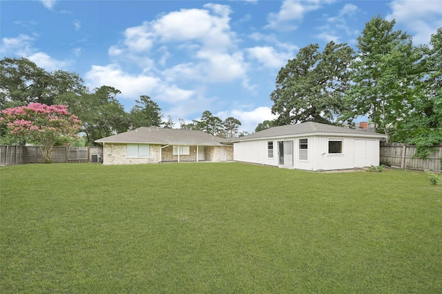 639 Ames St, Spring, TX 77373 - rear view of house with a fenced backyard