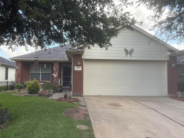 16426 Eton Brook Ln, Houston, TX 77073 - single story home featuring brick siding, driveway, a front lawn, and an attached garage
