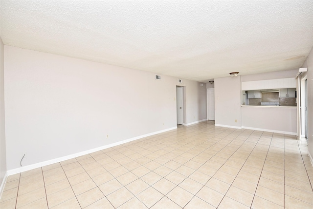 1950 Spenwick Dr Unit 408, Houston, TX 77055 - empty room featuring baseboards and a textured ceiling
