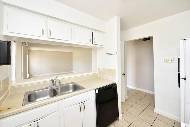 1950 Spenwick Dr Unit 408, Houston, TX 77055 - kitchen featuring dishwasher, light tile patterned floors, light countertops, white cabinets, and freestanding refrigerator