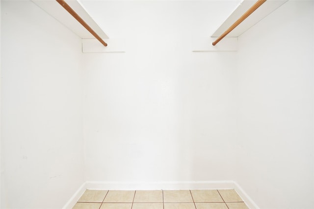 1950 Spenwick Dr Unit 408, Houston, TX 77055 - walk in closet featuring light tile patterned flooring