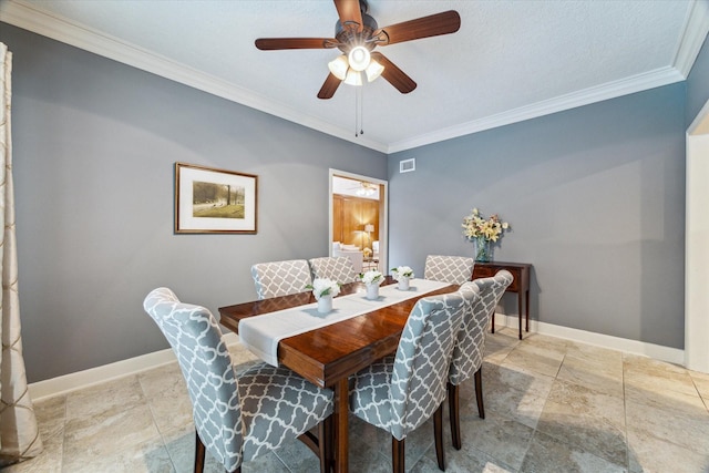 6019 Oak Creek Ln, Spring, TX 77379 - dining room with stone tile flooring, ornamental molding, and ceiling fan
