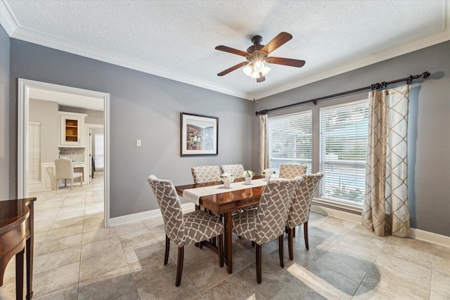 6019 Oak Creek Ln, Spring, TX 77379 - dining area with crown molding, a textured ceiling, and ceiling fan