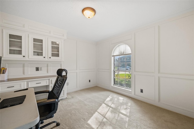 19702 Sweet Forest Ln, Humble, TX 77346 - home office with a decorative wall and light colored carpet