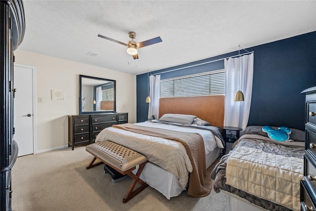 19702 Sweet Forest Ln, Humble, TX 77346 - carpeted bedroom with a ceiling fan and a textured ceiling