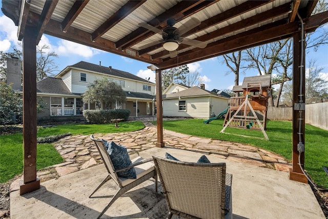 19702 Sweet Forest Ln, Humble, TX 77346 - view of patio featuring a playground and ceiling fan