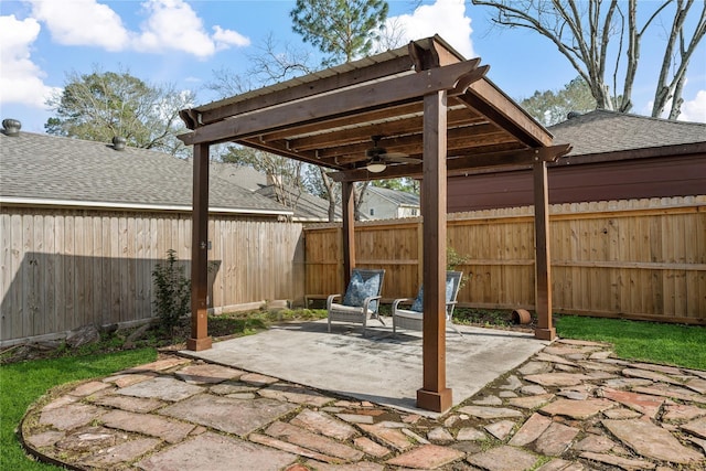 19702 Sweet Forest Ln, Humble, TX 77346 - fenced backyard featuring a ceiling fan, a patio, and a pergola