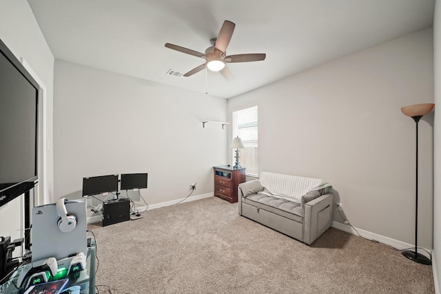 2849 Terrace Grove Dr, Conroe, TX 77304 - sitting room featuring a ceiling fan, carpet flooring, and a desk