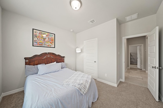 2849 Terrace Grove Dr, Conroe, TX 77304 - bedroom featuring light carpet and baseboards