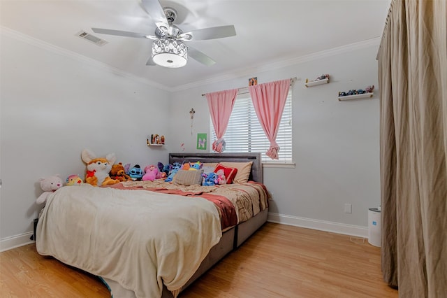 11906 Rowood Dr, Houston, TX 77070 - bedroom featuring light wood-type flooring, ornamental molding, and ceiling fan