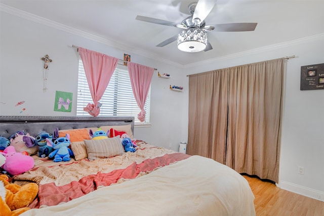 11906 Rowood Dr, Houston, TX 77070 - bedroom featuring crown molding, wood finished floors, and a ceiling fan