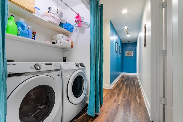 11906 Rowood Dr, Houston, TX 77070 - laundry area with washer and dryer and wood finished floors