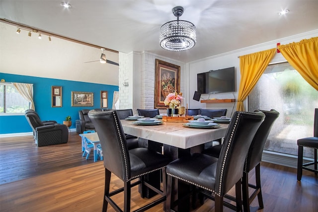 11906 Rowood Dr, Houston, TX 77070 - dining area featuring a chandelier, wood finished floors, and track lighting