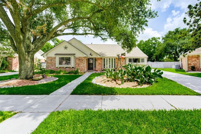 12327 Meadowhollow Dr, Meadows Place, TX 77477 - ranch-style home featuring brick siding