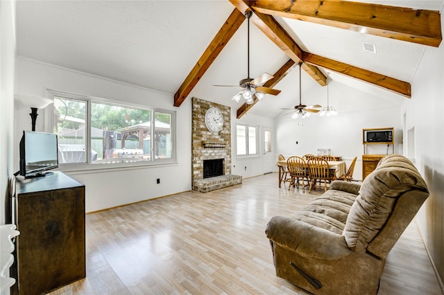 12327 Meadowhollow Dr, Meadows Place, TX 77477 - living room featuring a brick fireplace, wood finished floors, beamed ceiling, a ceiling fan, and high vaulted ceiling