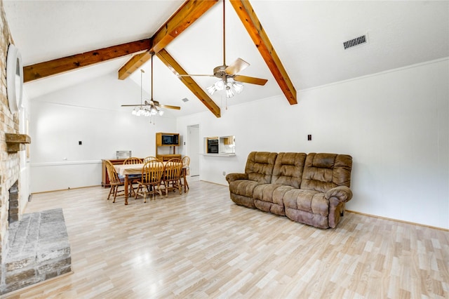 12327 Meadowhollow Dr, Meadows Place, TX 77477 - living room with a large fireplace, beamed ceiling, a ceiling fan, wood finished floors, and high vaulted ceiling