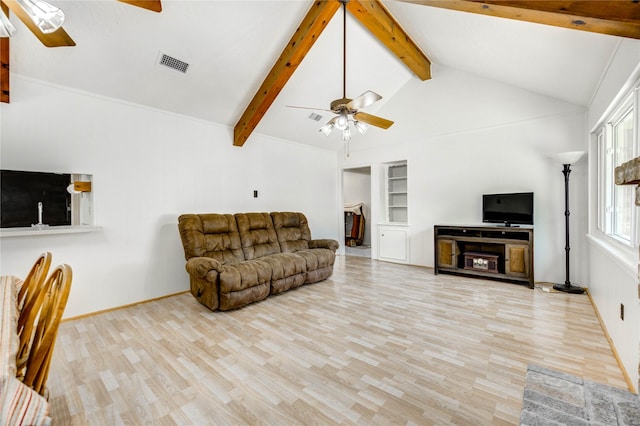 12327 Meadowhollow Dr, Meadows Place, TX 77477 - living area with ceiling fan, wood finished floors, and built in features