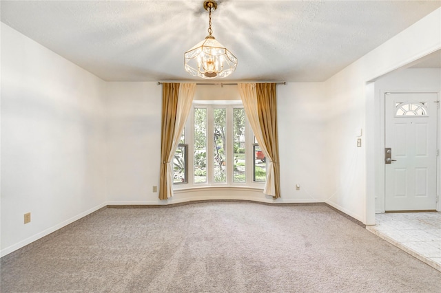 12327 Meadowhollow Dr, Meadows Place, TX 77477 - carpeted empty room featuring a chandelier and a textured ceiling