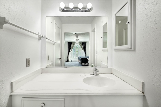 12327 Meadowhollow Dr, Meadows Place, TX 77477 - bathroom featuring vanity and a ceiling fan