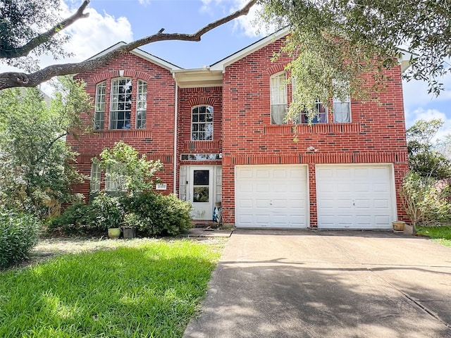 21307 Walden Grove Ln, Katy, TX 77450 - view of front of property featuring brick siding, driveway, and an attached garage