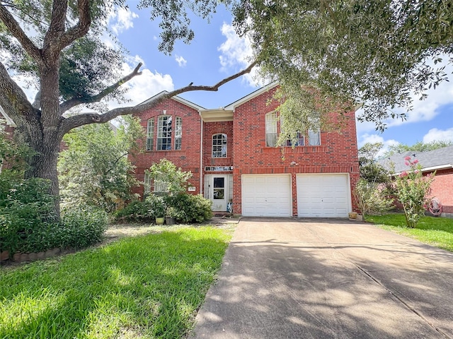 21307 Walden Grove Ln, Katy, TX 77450 - view of front of house with brick siding, concrete driveway, an attached garage, and a front yard