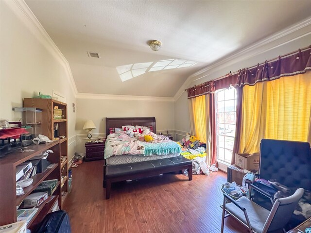 21307 Walden Grove Ln, Katy, TX 77450 - bedroom featuring lofted ceiling, ornamental molding, wood finished floors, a skylight, and wainscoting