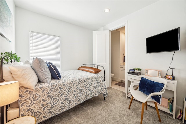 8764 Park Kolbe Ln, Houston, TX 77080 - bedroom with carpet, recessed lighting, ensuite bath, and vaulted ceiling