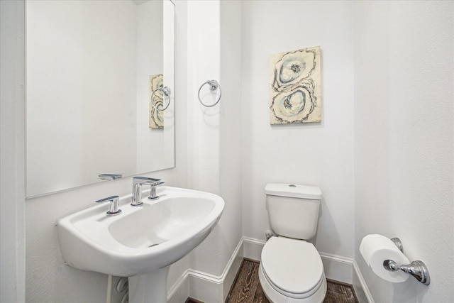 8764 Park Kolbe Ln, Houston, TX 77080 - bathroom with baseboards and wood finished floors