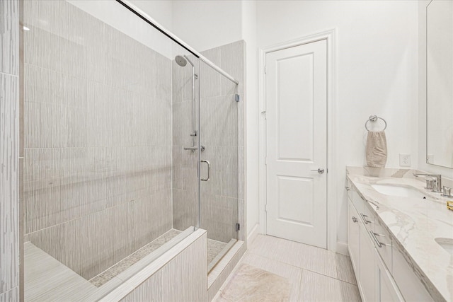 8764 Park Kolbe Ln, Houston, TX 77080 - full bath with a stall shower, double vanity, and tile patterned flooring