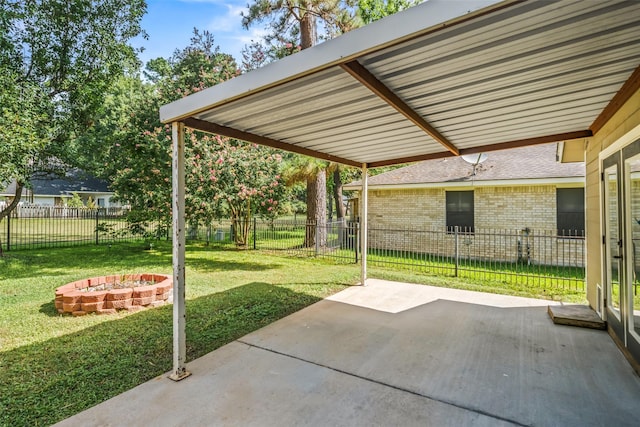 3019 Ramblewood Rd, Montgomery, TX 77356 - fenced backyard featuring a patio and a fire pit