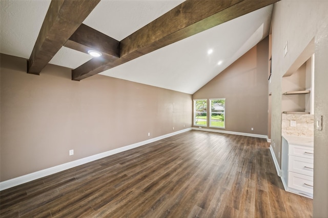 3019 Ramblewood Rd, Montgomery, TX 77356 - unfurnished living room featuring dark wood-style flooring, beamed ceiling, built in features, and high vaulted ceiling