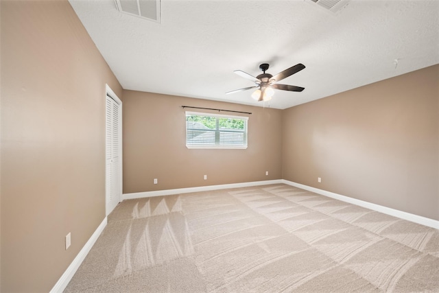 3019 Ramblewood Rd, Montgomery, TX 77356 - empty room featuring light colored carpet and a ceiling fan