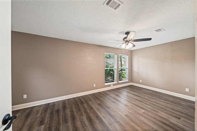 3019 Ramblewood Rd, Montgomery, TX 77356 - unfurnished room with dark wood-style flooring, ceiling fan, and a textured ceiling