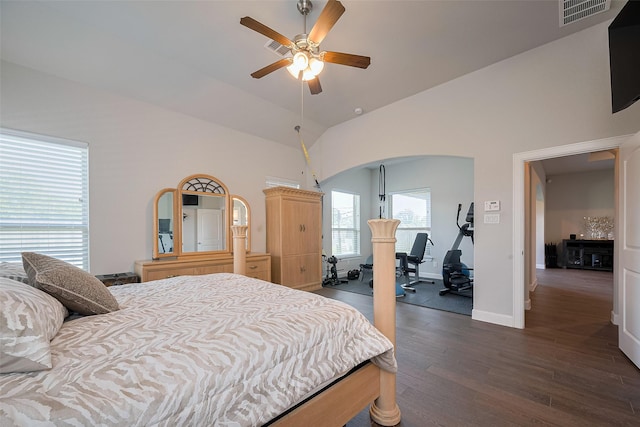 7707 Leighton Trl, Pasadena, TX 77505 - bedroom with dark wood-type flooring, arched walkways, high vaulted ceiling, a ceiling fan, and a desk