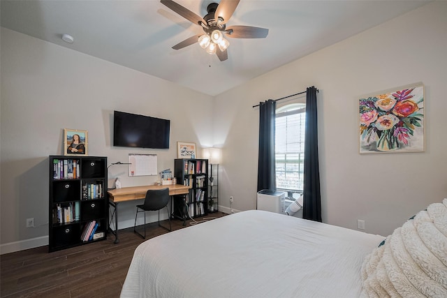 7707 Leighton Trl, Pasadena, TX 77505 - bedroom with dark wood finished floors, a ceiling fan, and an office area