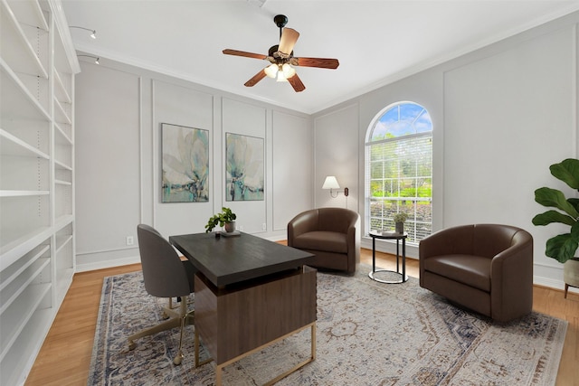 3519 E Pine Brook Way, Houston, TX 77059 - office area with crown molding, light wood-type flooring, a ceiling fan, and a decorative wall
