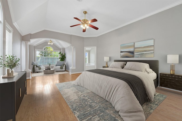 3519 E Pine Brook Way, Houston, TX 77059 - bedroom featuring decorative columns, light wood-style floors, lofted ceiling, crown molding, and arched walkways