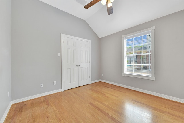 3519 E Pine Brook Way, Houston, TX 77059 - unfurnished bedroom with light wood finished floors, lofted ceiling, a closet, and a ceiling fan
