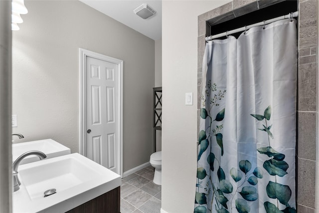 16887 Balmoral St, Montgomery, TX 77316 - bathroom featuring vanity, tile patterned floors, and a shower with shower curtain