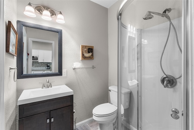 16887 Balmoral St, Montgomery, TX 77316 - full bath with a shower stall, vanity, and a textured wall